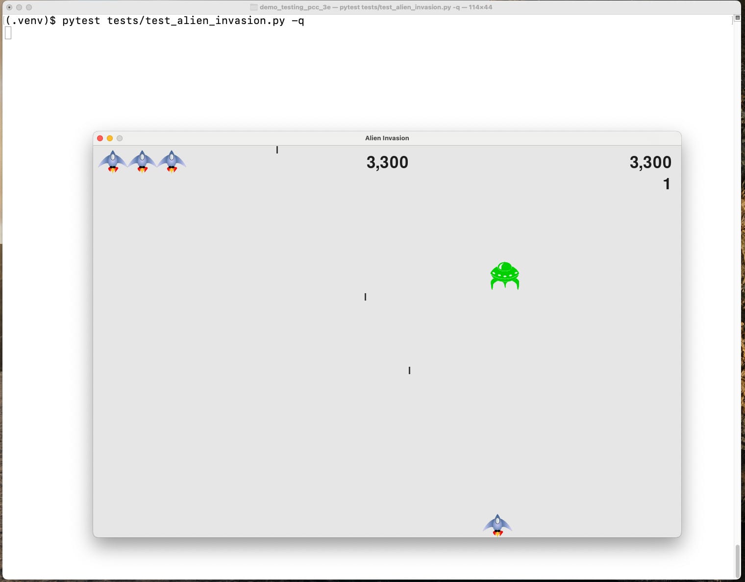 Terminal running pytest command, and game window open in front of terminal